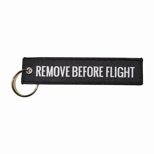 Remove Before Flight Safety Streamer Keychain (Color: Black)